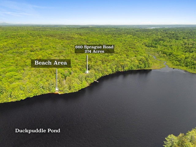 660 Sprague Rd, Waldoboro, ME 04572 - bird's eye view of a heavily wooded area and a nearby body of water