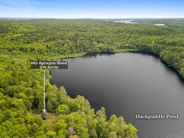 660 Sprague Rd, Waldoboro, ME 04572 - drone / aerial view of a heavily wooded area and a nearby body of water