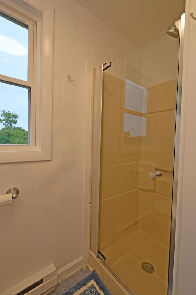 5 Dyke Rd Unit G, Kennebunkport, ME 04046 - bathroom with baseboard heating, a stall shower, and ornamental molding