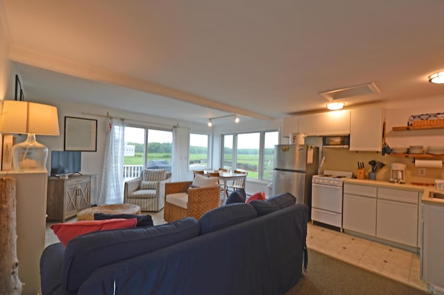 5 Dyke Rd Unit G, Kennebunkport, ME 04046 - living room featuring light tile patterned floors