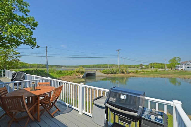 5 Dyke Rd Unit G, Kennebunkport, ME 04046 - deck featuring grilling area, outdoor dining area, and a water view