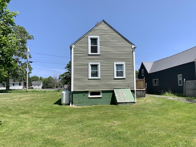 14 Third St, Eastport, ME 04631 - back of property with a lawn
