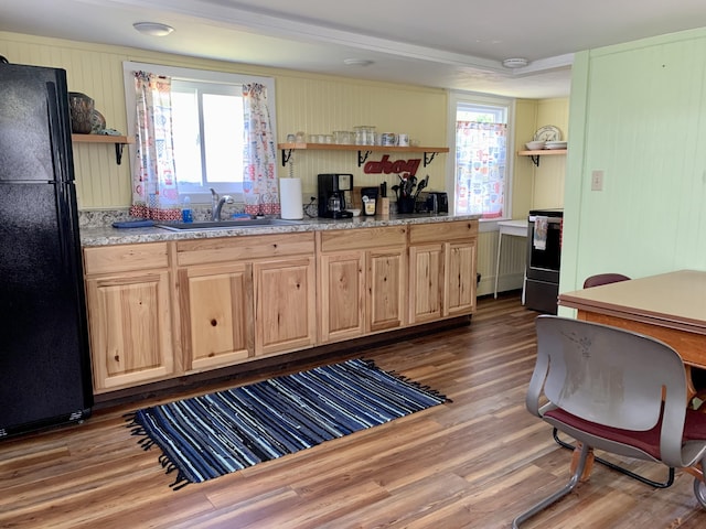 14 Third St, Eastport, ME 04631 - kitchen featuring open shelves, freestanding refrigerator, light brown cabinetry, and stainless steel stove