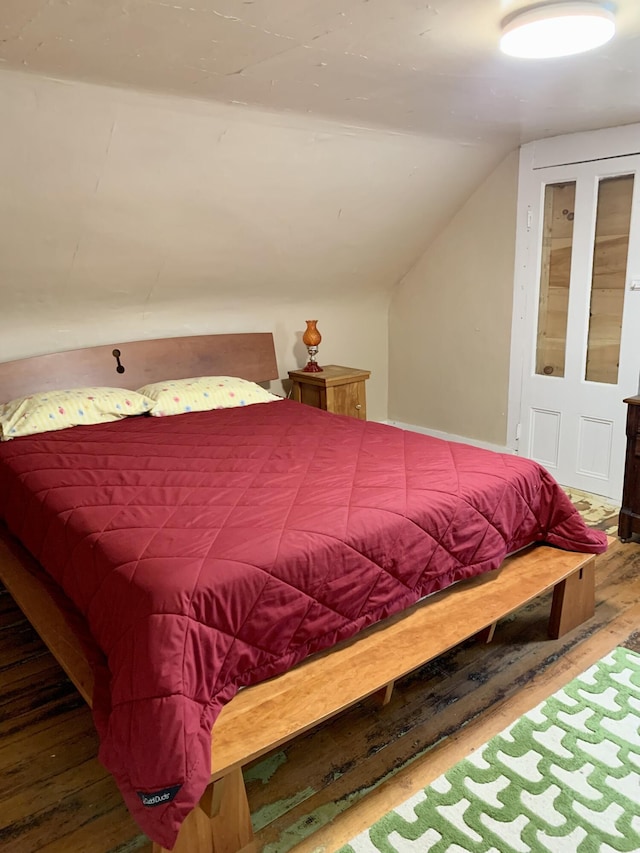 14 Third St, Eastport, ME 04631 - bedroom featuring wood-type flooring and vaulted ceiling