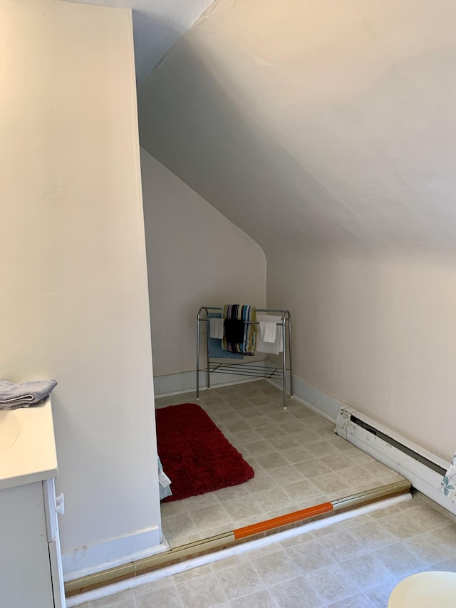 14 Third St, Eastport, ME 04631 - interior space featuring vaulted ceiling and baseboard heating