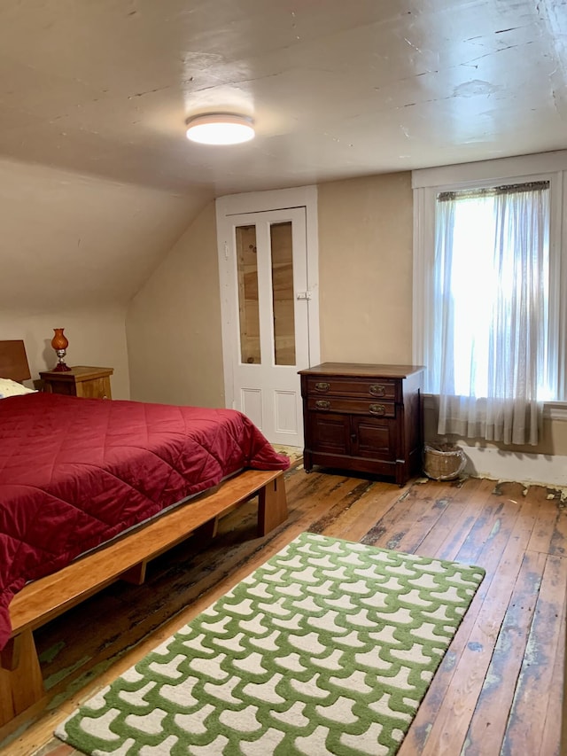14 Third St, Eastport, ME 04631 - bedroom featuring hardwood / wood-style flooring and vaulted ceiling