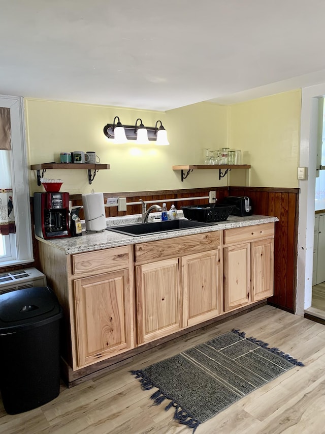 14 Third St, Eastport, ME 04631 - kitchen featuring a wainscoted wall, light wood-style floors, light brown cabinets, and open shelves