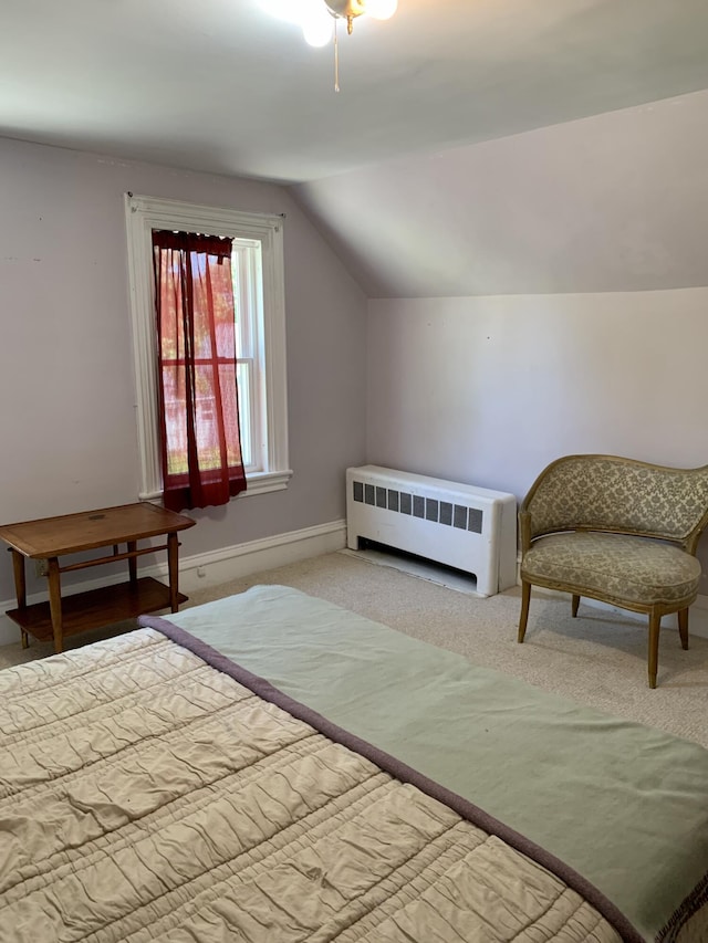 14 Third St, Eastport, ME 04631 - bedroom featuring radiator heating unit, lofted ceiling, and carpet