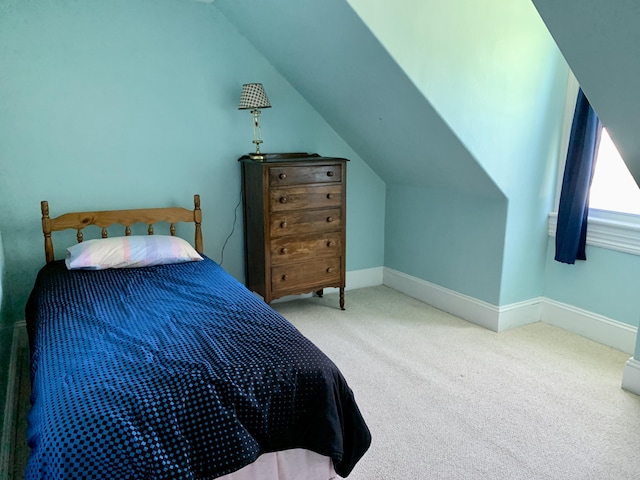 14 Third St, Eastport, ME 04631 - bedroom with carpet flooring and vaulted ceiling