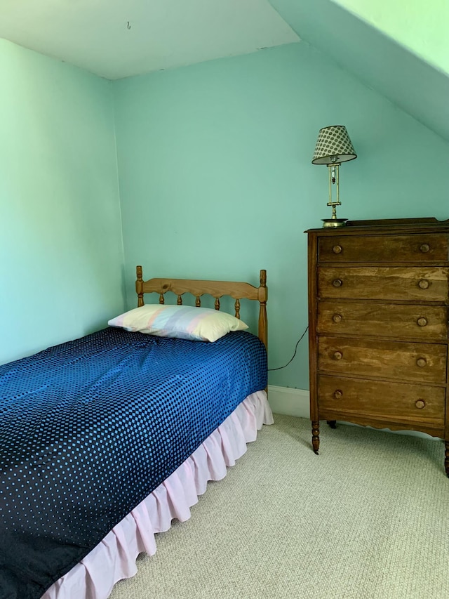 14 Third St, Eastport, ME 04631 - bedroom with carpet flooring and vaulted ceiling