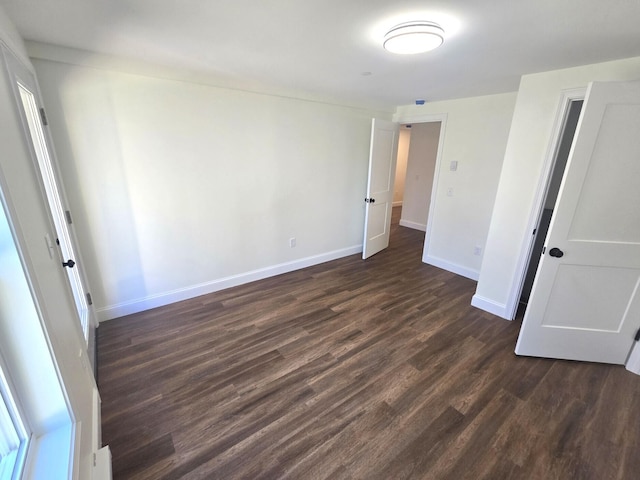 17 Signal St Unit I-1, Sanford, ME 04083 - unfurnished bedroom with dark wood finished floors and baseboards