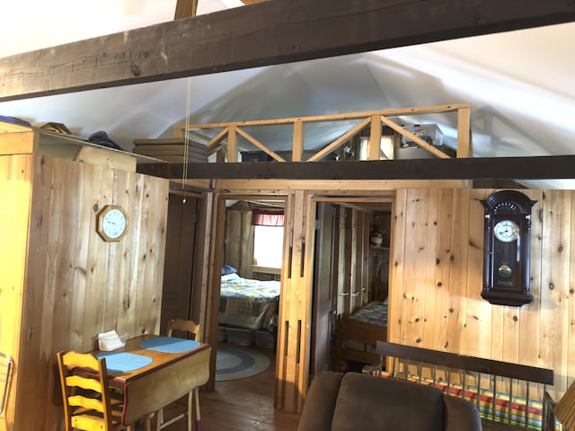 107 Haskell Ave, Raymond, ME 04071 - interior space with wooden walls, wood finished floors, and lofted ceiling
