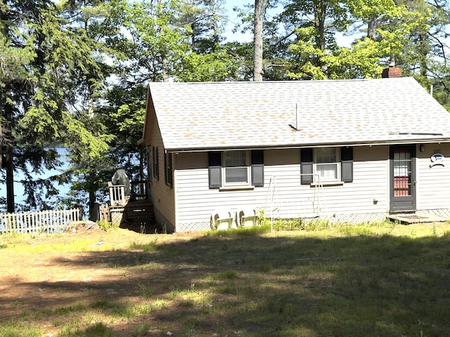 107 Haskell Ave, Raymond, ME 04071 - view of front of property with a chimney and roof with shingles
