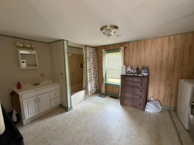 152 Kansas Rd, Milbridge, ME 04658 - full bath featuring shower / tub combo with curtain, vanity, wooden walls, and washer / dryer