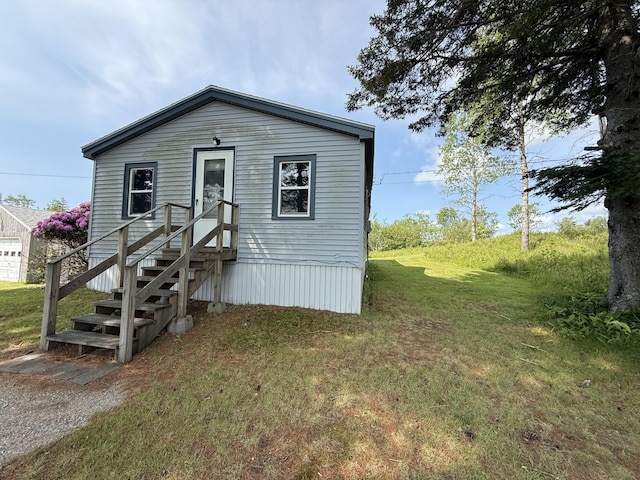 152 Kansas Rd, Milbridge, ME 04658 - view of front facade featuring a front lawn