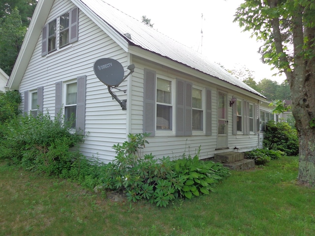 59 Main St, Shapleigh, ME 04076 - view of side of property with a metal roof