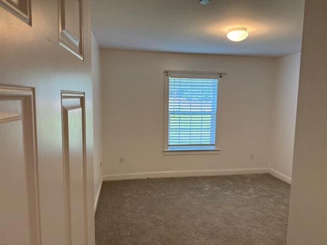 345 Saco St Unit 40, Westbrook, ME 04092 - carpeted empty room with baseboards
