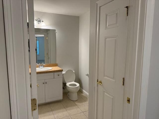 345 Saco St Unit 40, Westbrook, ME 04092 - half bath with vanity and tile patterned floors