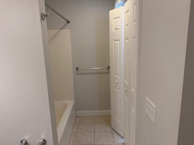 345 Saco St Unit 40, Westbrook, ME 04092 - full bathroom with a tub to relax in, a shower, and tile patterned flooring