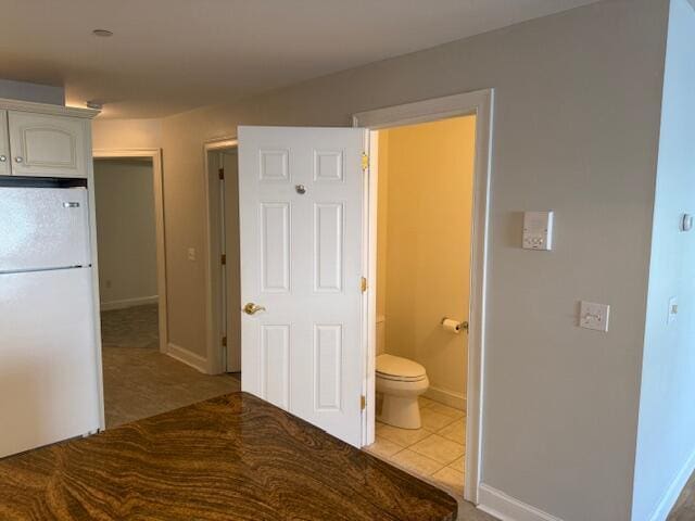 345 Saco St Unit 40, Westbrook, ME 04092 - bathroom with toilet and tile patterned flooring