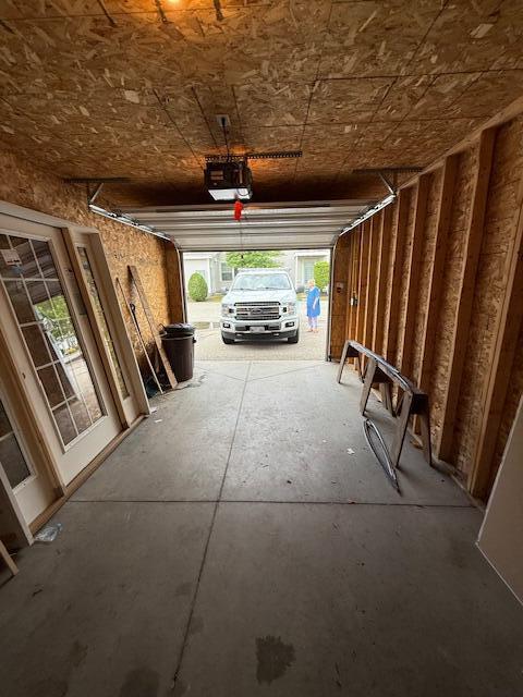 345 Saco St Unit 40, Westbrook, ME 04092 - garage featuring a garage door opener