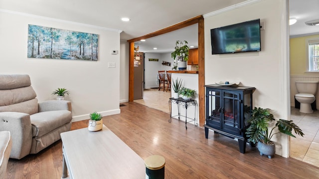 2857 Ohio St, Glenburn, ME 04401 - living area featuring crown molding, recessed lighting, and light wood-style floors