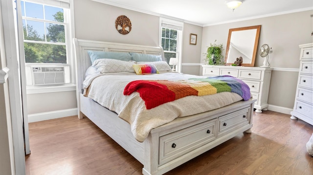 2857 Ohio St, Glenburn, ME 04401 - bedroom with wood finished floors and ornamental molding