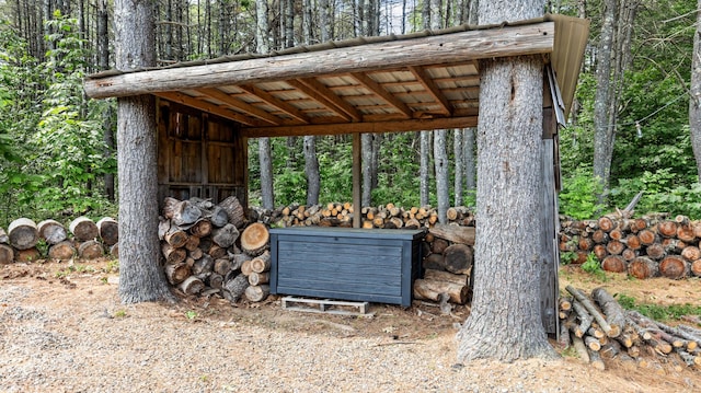 2857 Ohio St, Glenburn, ME 04401 - view of outbuilding featuring a forest view