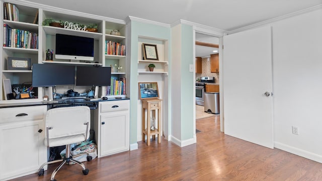 2857 Ohio St, Glenburn, ME 04401 - office space with crown molding, wood finished floors, and built in study area