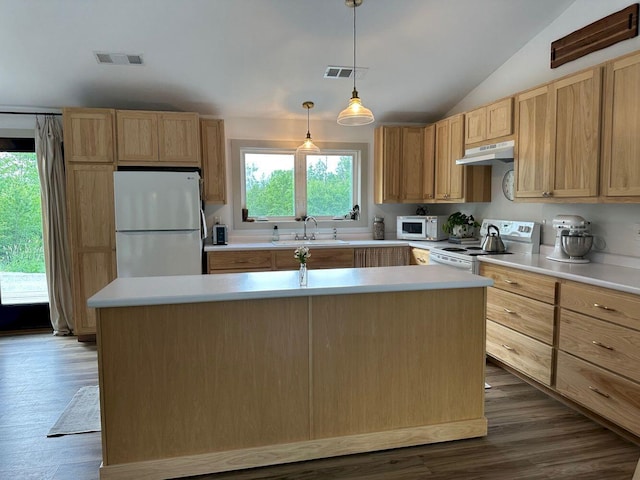 599 Mile Square Rd, Avon, ME 04966 - kitchen featuring white appliances, light brown cabinetry, under cabinet range hood, vaulted ceiling, and light countertops