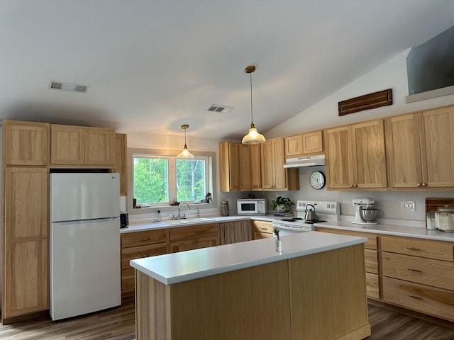 599 Mile Square Rd, Avon, ME 04966 - kitchen with white appliances, under cabinet range hood, dark wood-style flooring, light countertops, and vaulted ceiling