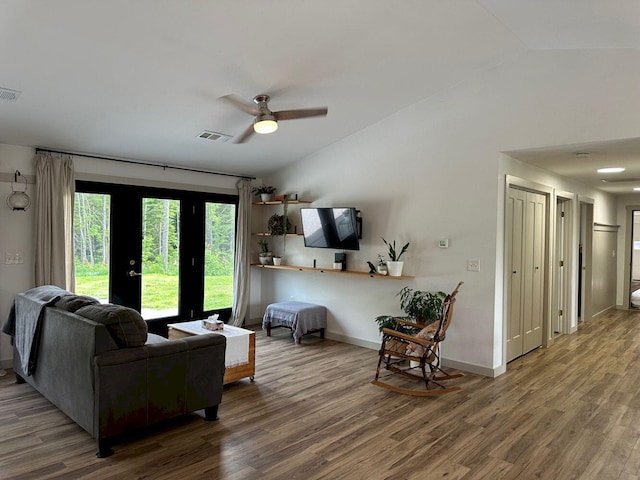 599 Mile Square Rd, Avon, ME 04966 - living room with vaulted ceiling, wood finished floors, and a ceiling fan