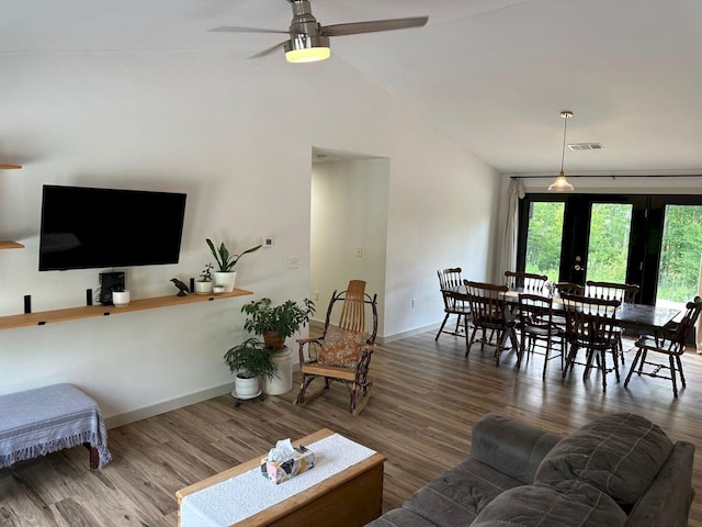 599 Mile Square Rd, Avon, ME 04966 - living area with a ceiling fan, wood finished floors, french doors, and high vaulted ceiling