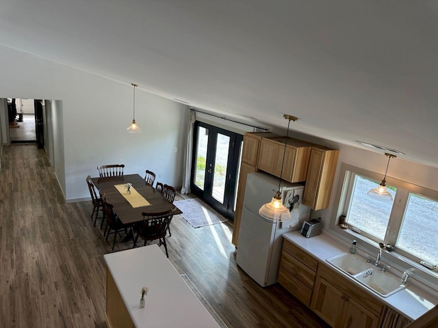 599 Mile Square Rd, Avon, ME 04966 - kitchen featuring refrigerator, dark wood finished floors, and hanging light fixtures