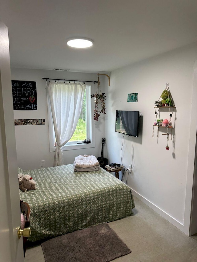 599 Mile Square Rd, Avon, ME 04966 - bedroom with baseboards and carpet floors
