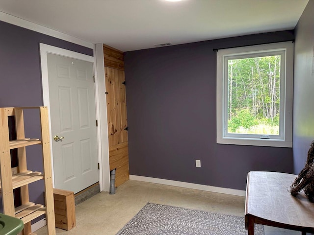 599 Mile Square Rd, Avon, ME 04966 - living area featuring baseboards and concrete floors