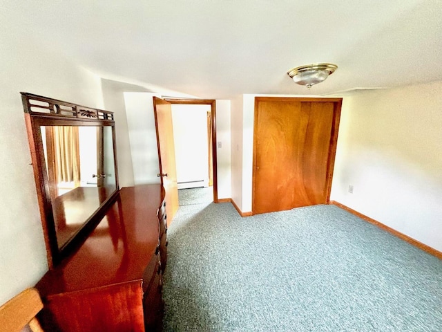 41 York St, Millinocket, ME 04462 - unfurnished bedroom featuring a baseboard radiator, carpet, a closet, and french doors