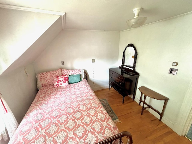 41 York St, Millinocket, ME 04462 - bedroom with wood finished floors and lofted ceiling