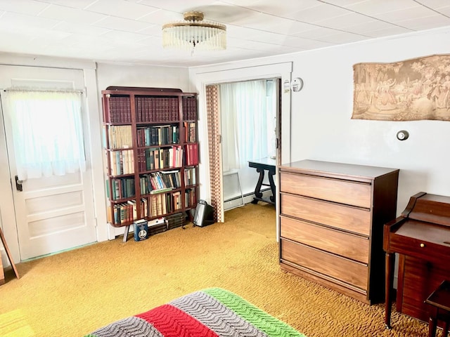 41 York St, Millinocket, ME 04462 - living area with light colored carpet, a baseboard radiator, and ornamental molding