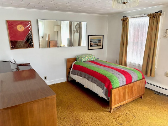 41 York St, Millinocket, ME 04462 - carpeted bedroom featuring crown molding and a baseboard heating unit