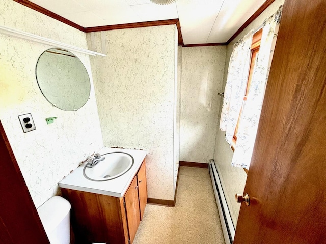 41 York St, Millinocket, ME 04462 - bathroom with a baseboard radiator, vanity, and crown molding