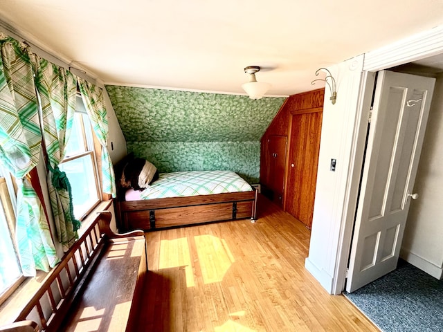 41 York St, Millinocket, ME 04462 - bedroom featuring light wood-type flooring and multiple windows
