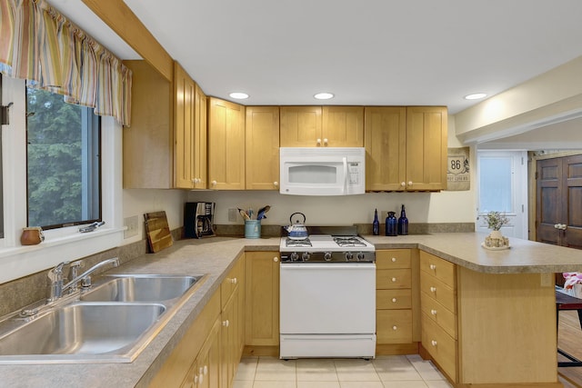 86 Sandy Cove Rd, Standish, ME 04084 - kitchen featuring white appliances, a peninsula, recessed lighting, light tile patterned flooring, and light countertops
