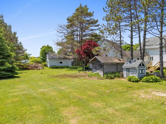 39 Elm St, South Thomaston, ME 04858 - view of green lawn with a storage unit