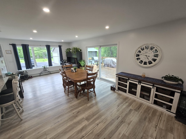 1083 N Rd, Newburgh, ME 04444 - dining room with recessed lighting, light wood finished floors, healthy amount of natural light, and a baseboard heating unit