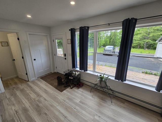 1083 N Rd, Newburgh, ME 04444 - foyer entrance with recessed lighting and light wood-style floors