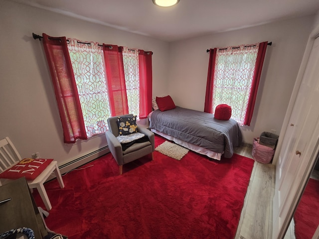 1083 N Rd, Newburgh, ME 04444 - bedroom featuring baseboard heating and wood finished floors