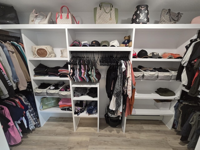 1083 N Rd, Newburgh, ME 04444 - walk in closet featuring wood finished floors
