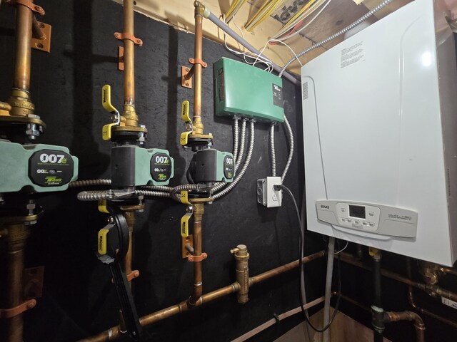 1083 N Rd, Newburgh, ME 04444 - utility room with water heater