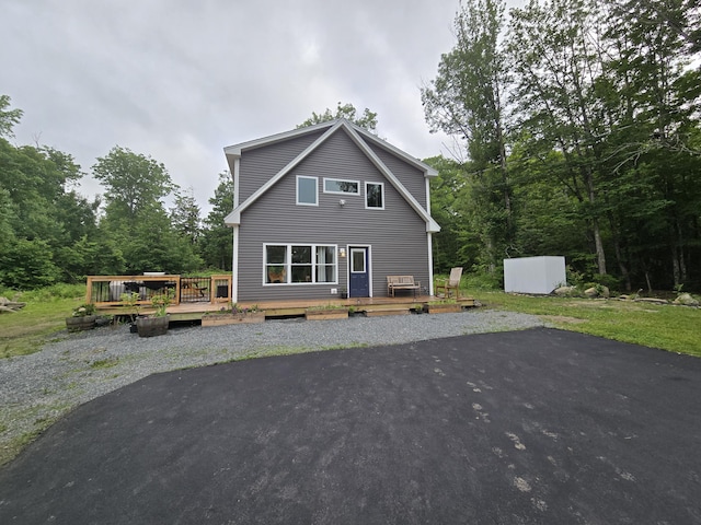 1083 N Rd, Newburgh, ME 04444 - back of property with a deck
